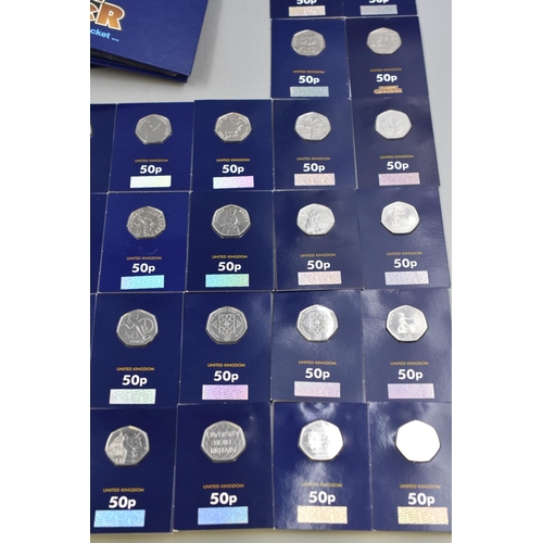 29 - Selection of 52 Mounted Change Checker 50p Coins including Jemma Puddle duck, Team GB, Paddington, P... 