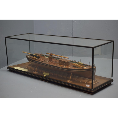 152 - Large Cased Scale Model of Commissioner Harrison's Gunboat of 1808 in a Glass Case. 89cm Long, 31cm ... 