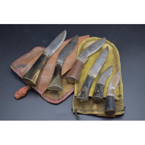 156 - Six Small Gurkha Kukri Skinning Knives, contained in Two Leather Pouches