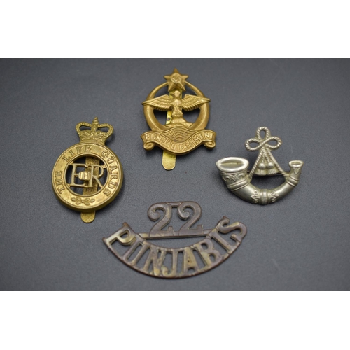 157 - Four Military Badges including Punjab Regiment, The Life Guards and The British Light Infantry