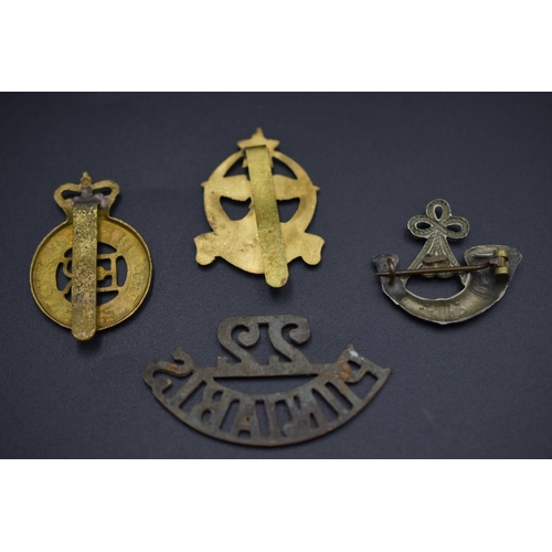 157 - Four Military Badges including Punjab Regiment, The Life Guards and The British Light Infantry