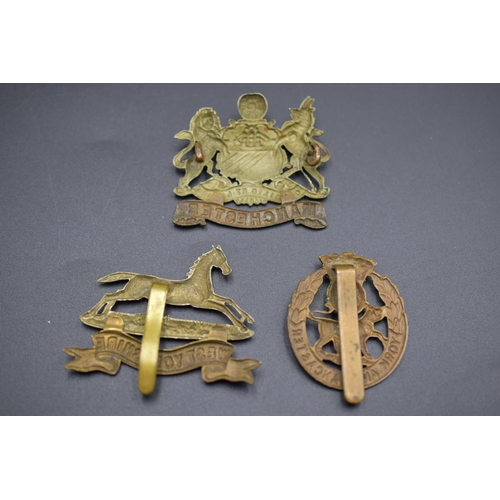 176 - Three Cap Badges, includes York & Lancaster, Manchester and West Yorkshire