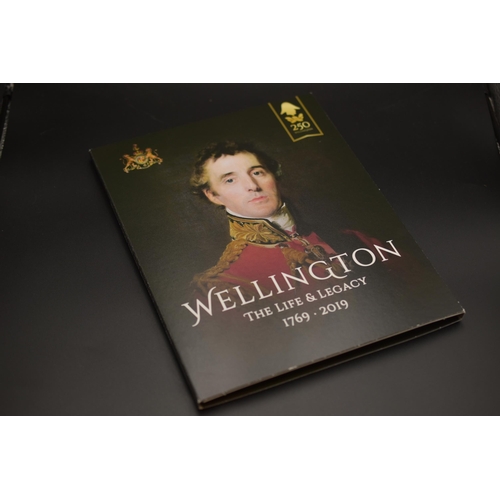 74 - Wellington The Life & Legacy Collectable Coin Folder including Five Commemorative Coins