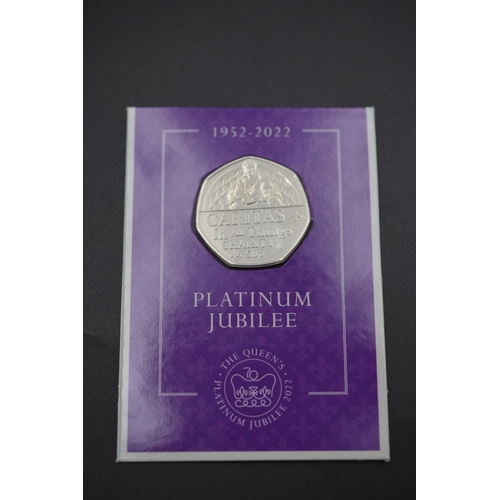 80 - Brilliant Uncirculated Platinum Jubilee Fifty Pence Coin. Caritas, In all Things Charity.