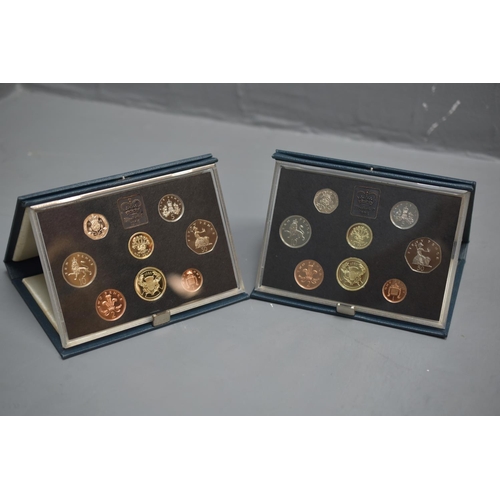 73 - Two Royal Mint 1986 Proof Coin Sets Complete in Cases with Certificates