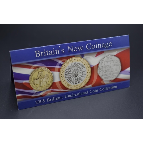 77 - 2005 Brilliant Uncirculated Coin Collection to include Menai Bridge £1, Gun Powder Pot £2 Coin and J... 