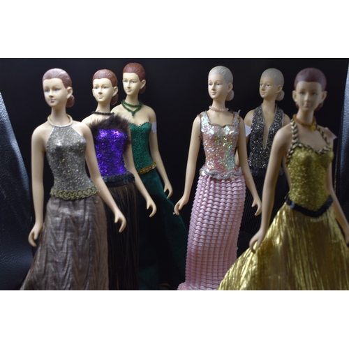 97 - A Set of Eight Resin Fashion Figures, Approx 11