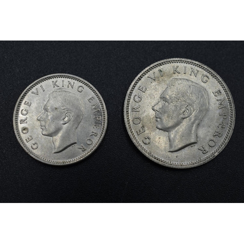 Silver New Zealand Coinage to Include : 
George VI - One Shilling (1943) and a Six Pence (1943)