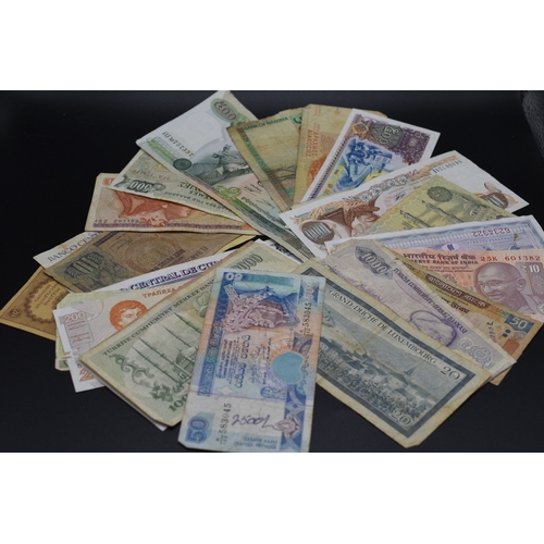 77 - Twenty Five Mixed Worldwide Bank Notes