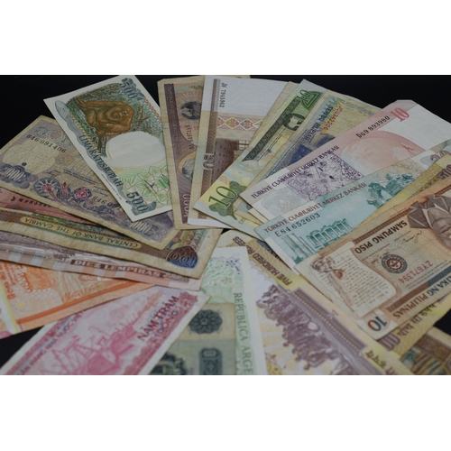 81 - Twenty Five Mixed Worldwide Bank Notes