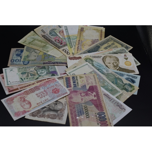 82 - Twenty Five Mixed Worldwide Bank Notes