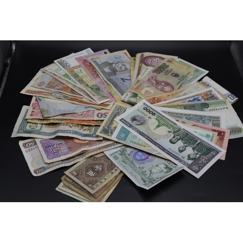 87 - Fifty Mixed Worldwide Bank Notes