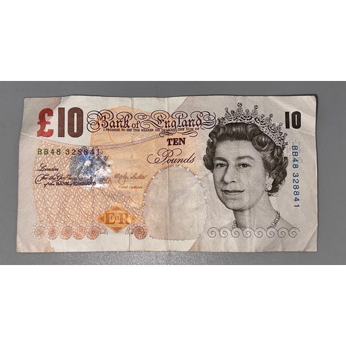 101 - £10 Mint Error Bank Note ( Signature : Merlyn Lowther ) 

Offset, Part of Front on Back