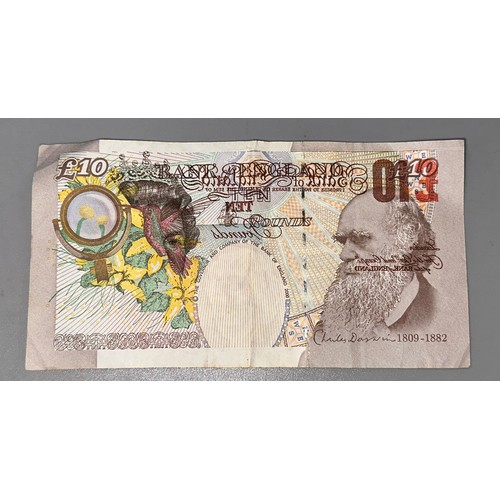 101 - £10 Mint Error Bank Note ( Signature : Merlyn Lowther ) 

Offset, Part of Front on Back