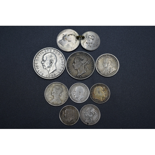 7 - Selection of 9 Silver Foreign Coins