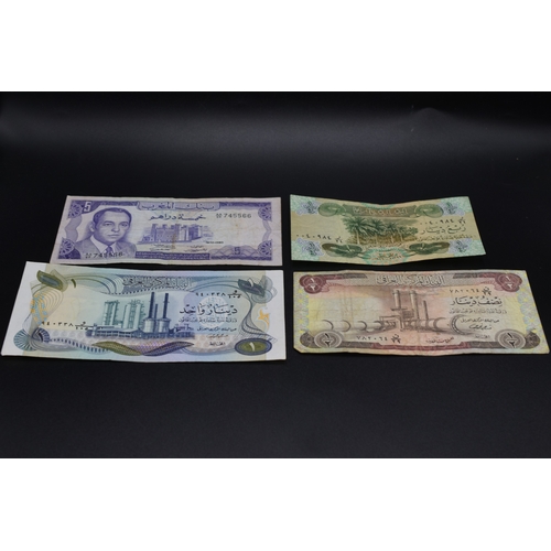 21 - Three Iraq Bank Notes including a 1971 One Dinar and a Banque of Morocco 5 Dirhams