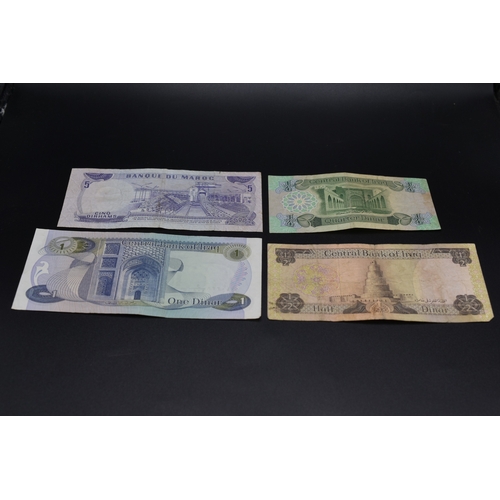 21 - Three Iraq Bank Notes including a 1971 One Dinar and a Banque of Morocco 5 Dirhams