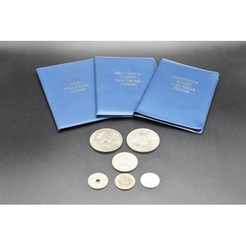 42 - Three Britain's First Decimal Coins and a Small Selection of Coins