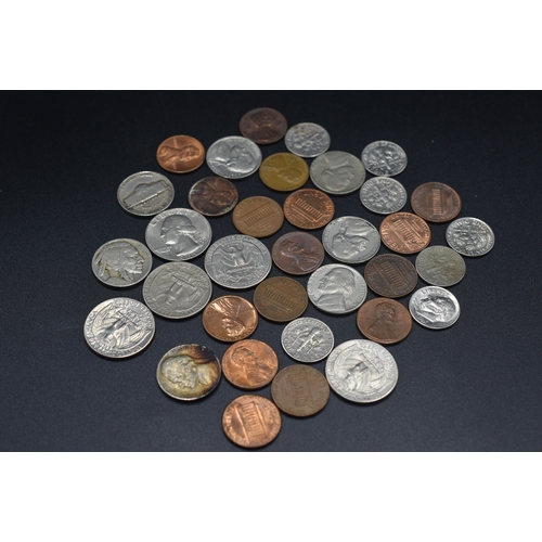 10 - Assortment of USA Coinage including Qtrs., Dimes, Nickels and Cents.