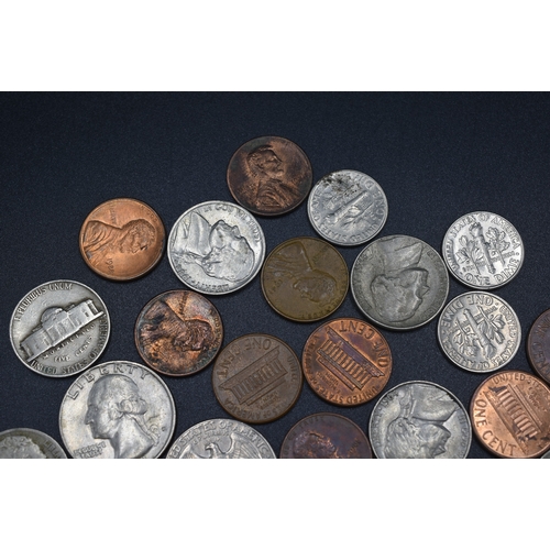 10 - Assortment of USA Coinage including Qtrs., Dimes, Nickels and Cents.