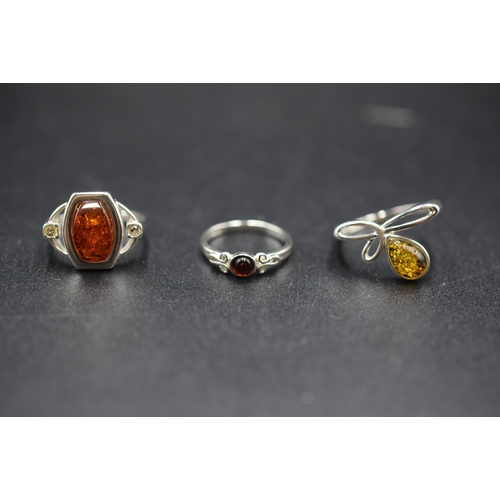 66 - Three Silver Amber Rings