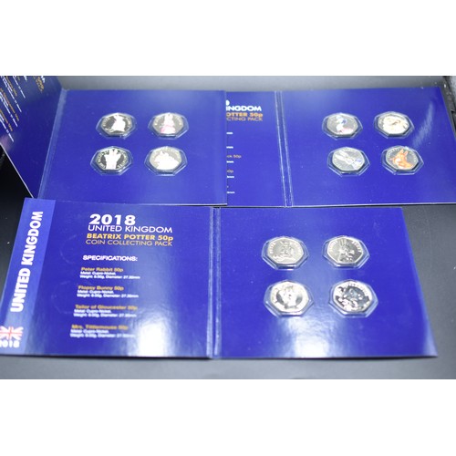 63 - Selection of 12 cased Beatrix Potter 50p Collectors  Coins