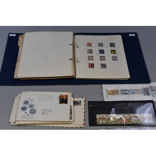 35 - Folder containing a selection of Worldwide Stamps dating from Queen Victoria including Penny Reds, O... 