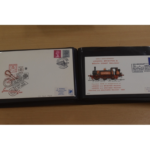 56 - Two Albums Containing Train Stamps to Include The Locomotive Philatelic Album