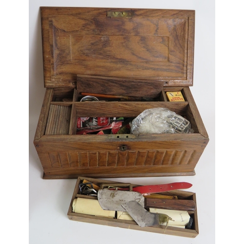 105 - A hardwood fitted work box containing shoe and leather working accessories, a four drawer stationery... 