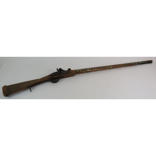 109 - A mid 19th British army Tower armoury percussion rifle, later modified in Arabia with pinwork and br... 