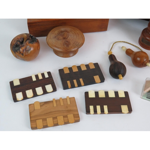 111 - A selection of collectable treen items including a rosewood book slide, string box, bell pushes, whi... 