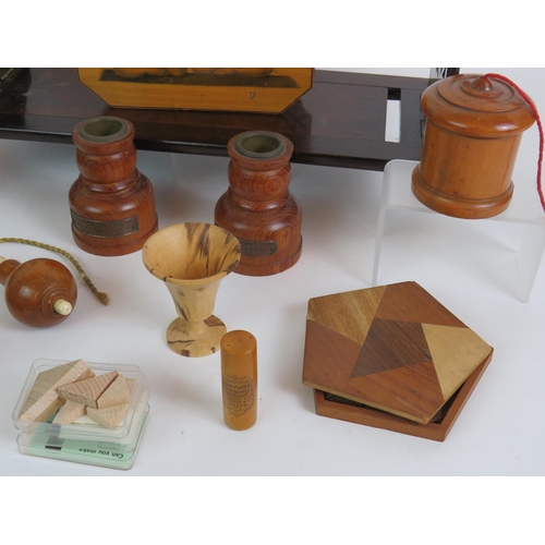 111 - A selection of collectable treen items including a rosewood book slide, string box, bell pushes, whi... 