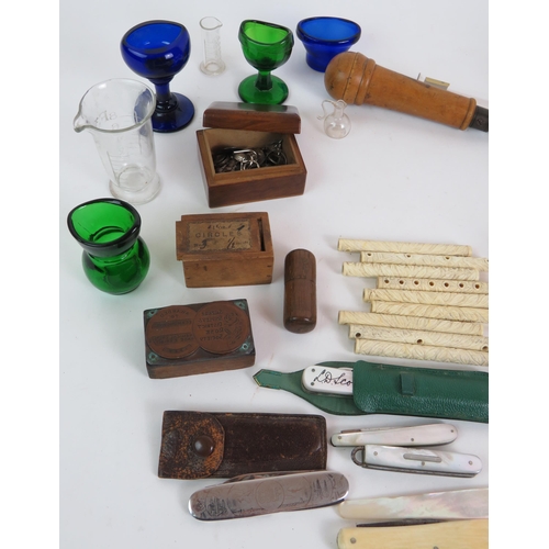 116 - A selection of mainly antique collectables including folding knives, clock keys, card case, eye bath... 