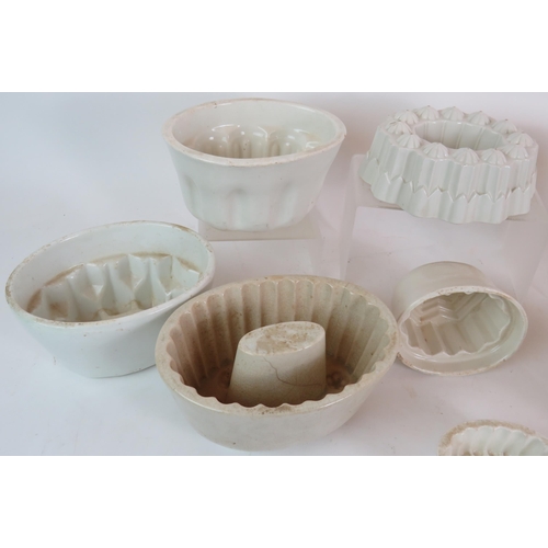 118 - A collection of nine antique white porcelain jelly moulds including Copeland, Shelley & Wedgwood. La... 