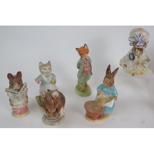 130 - A collection of thirteen Beswick Beatrix Potter figures with gold oval back stamps C1950s. (13). Con... 