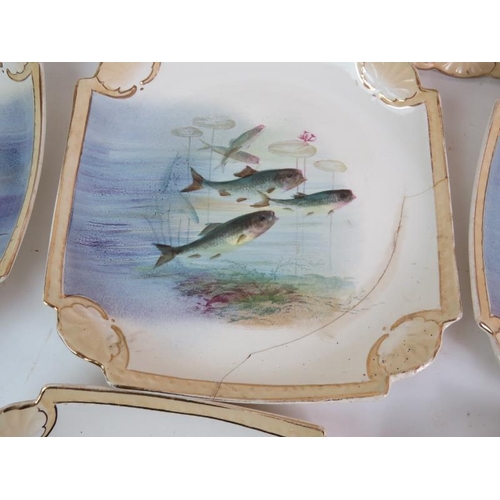 131 - A late 19th Century German porcelain 12 piece fish service by Franz Ant Mehlem, each piece individua... 