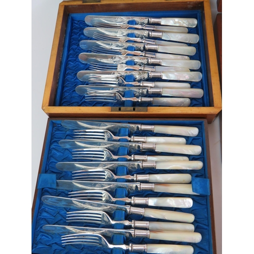 142 - A mahogany cased canteen of 12 silver plated fish knives and forks, a similar set of 12 fruit knives... 