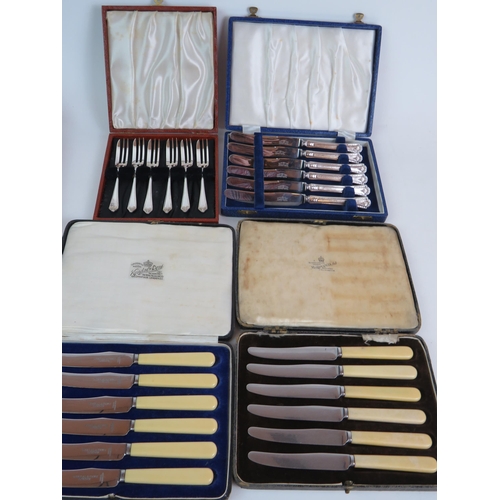 142 - A mahogany cased canteen of 12 silver plated fish knives and forks, a similar set of 12 fruit knives... 