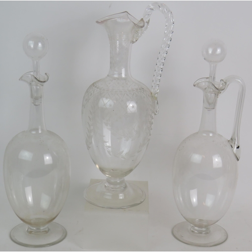 148 - Seven mixed 19th/20th Century decanters and claret jugs including a French four section liqueur deca... 