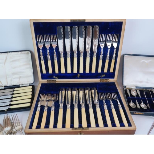 149 - A wooden canteen of Edwardian silver plated fish cutlery, a cased set of tea spoons, a cased set of ... 