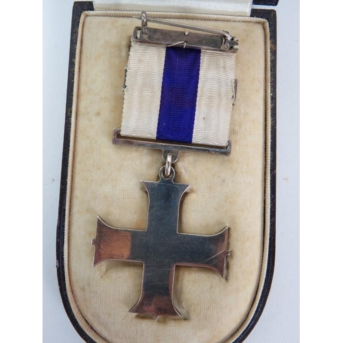 15 - A WWI military cross medal group and associated militaria medals awarded to Lt Col L. D. Scott, East... 