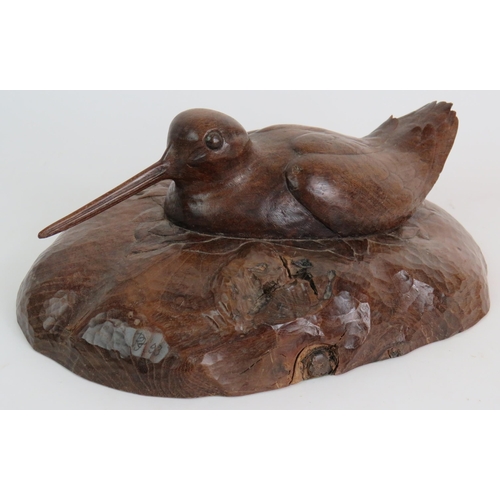 154 - A very well carved figure of a sitting woodcock, carved from mulberry wood 1993 and a turned teak Bu... 