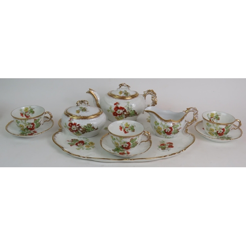 156 - A 10 piece Continental porcelain tea set, C1910 plus four Continental porcelain cups and saucers. (1... 