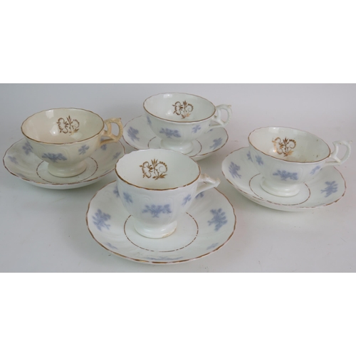 156 - A 10 piece Continental porcelain tea set, C1910 plus four Continental porcelain cups and saucers. (1... 