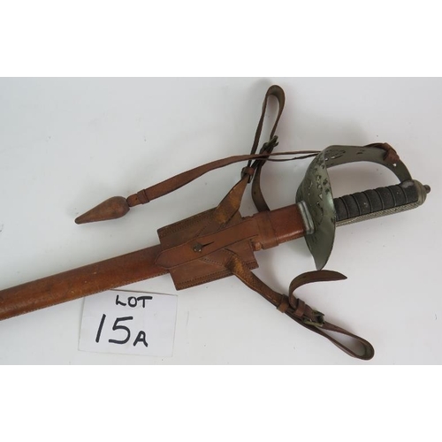 15A - A WWI officer's dress sword with leather scabbard and frog, property of Lt Col L. D. Scott M. C. Ove... 