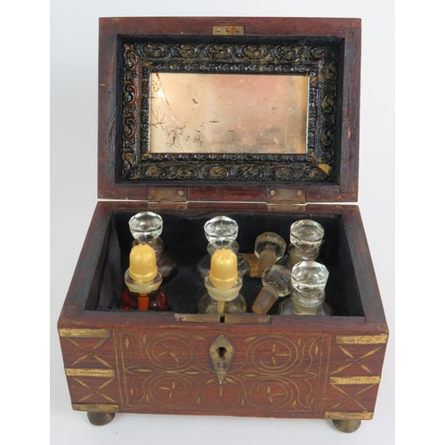 161 - An antique brass inlaid rosewood perfume box with internal mirror and divisions for 6 bottles plus a... 