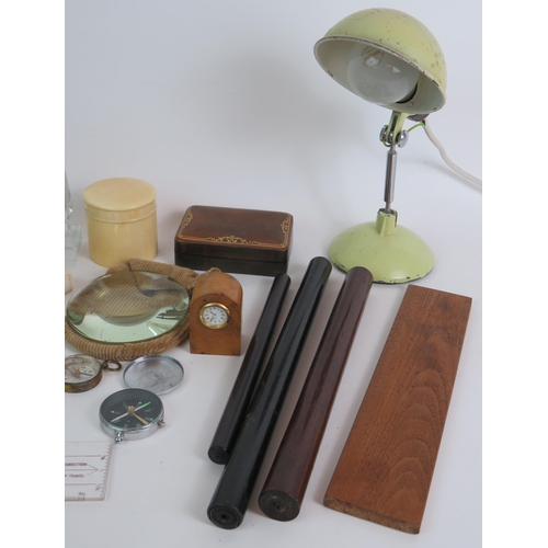 162 - A collection of desk top collectables including a mid century lamp, magnifier, ebony rules, statione... 