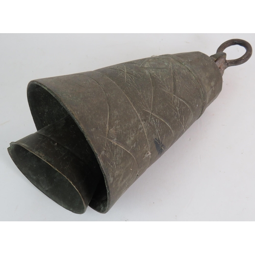 163 - A large bronze Eastern bell, a leather bound wooden club, an Eastern bronze gong, bone fly swat, tre... 