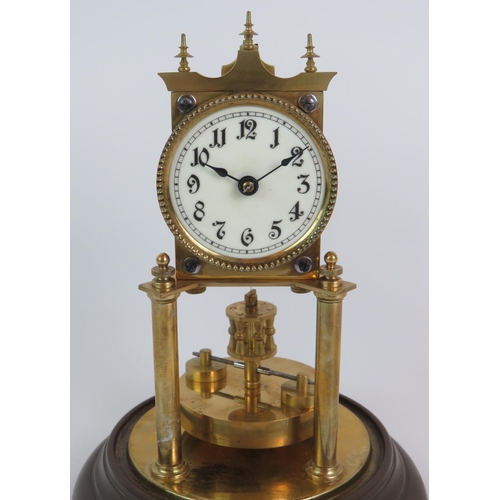 169 - A good quality brass 400 day anniversary clock under glass dome stamped number 79680. Height 28cm. C... 