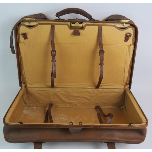 170 - A good quality vintage leather travel case with brass fittings and fully lined circa 1930's. 56cm x ... 